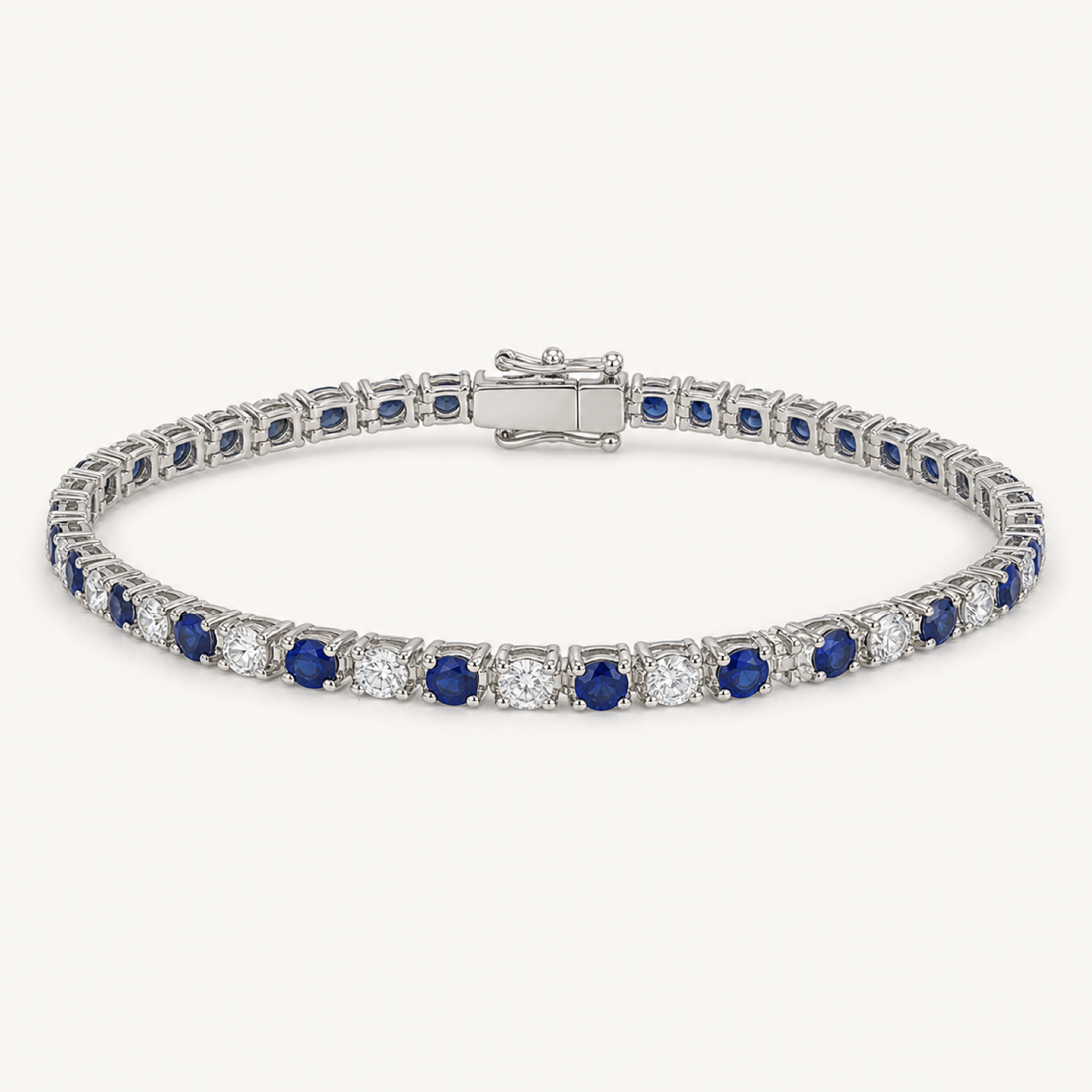 Blue sapphire tennis bracelet on a clean white background