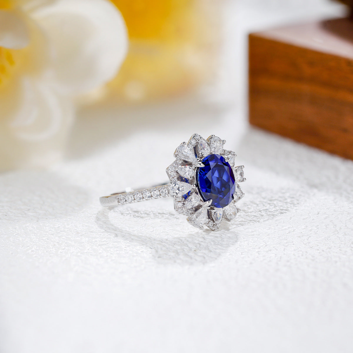 The Isadora Blue Sapphire Halo Jewelry Suite