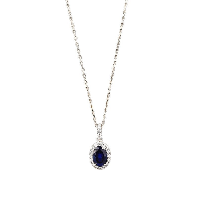 The Isolde Royal Blue Oval Halo Pendant Necklace
