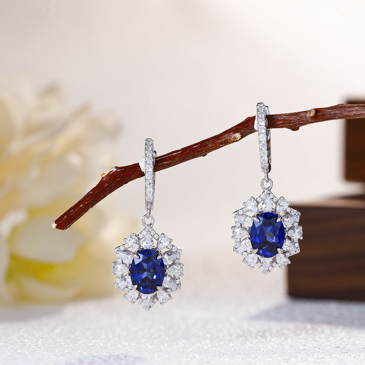The Isadora Blue Sapphire Halo Jewelry Suite