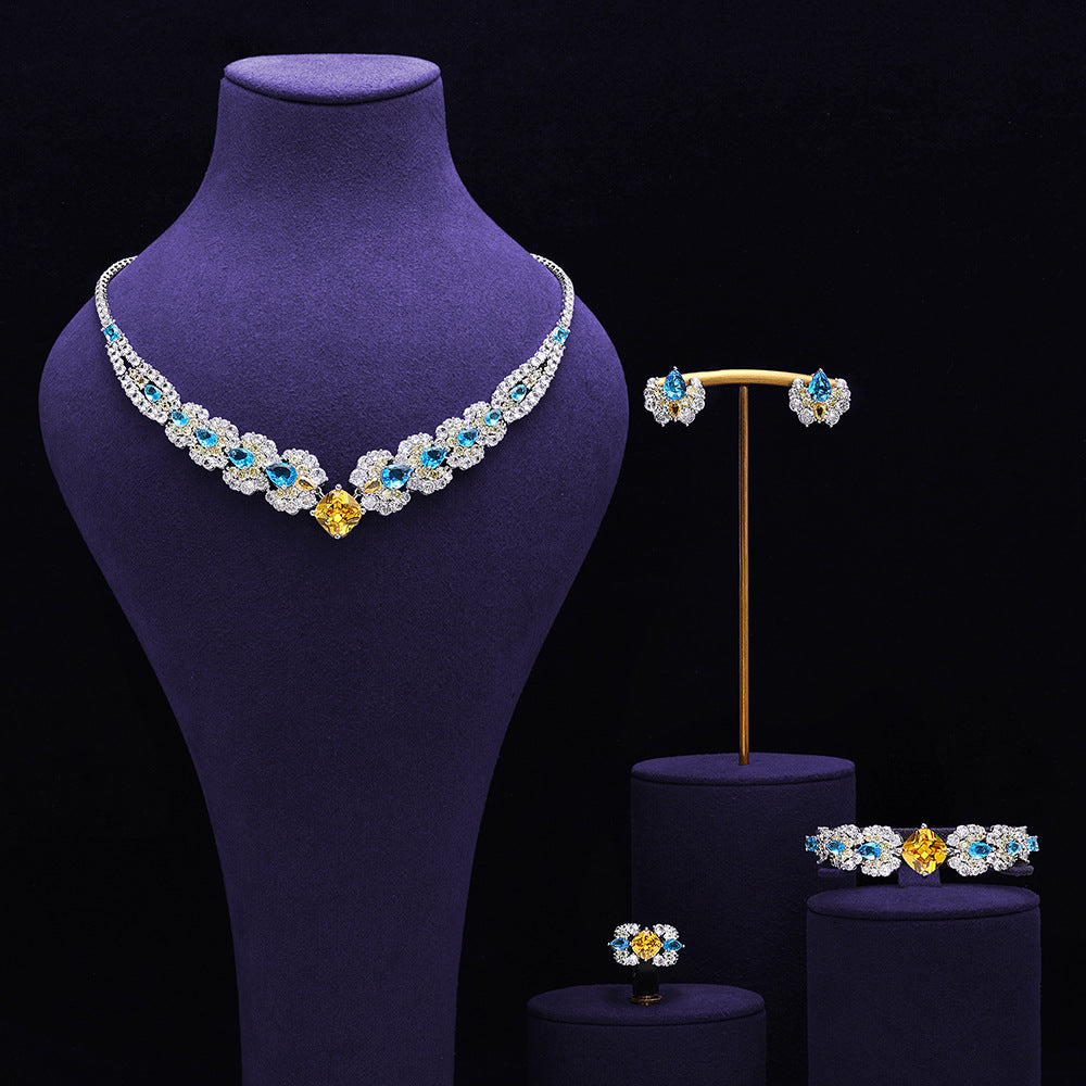The Soleil Blue & Gold Floral Jewelry Set