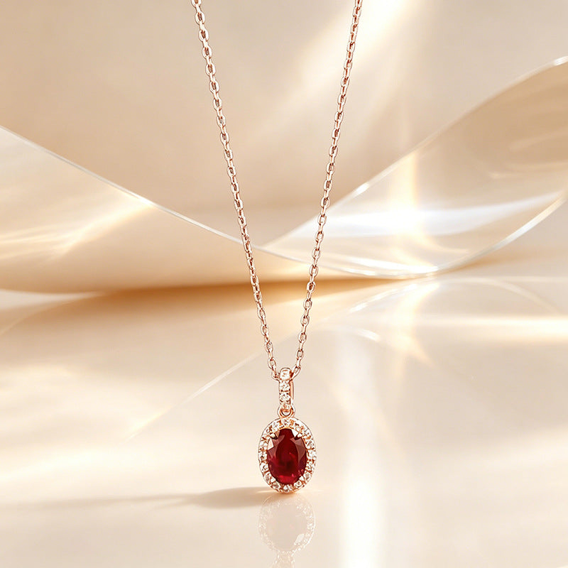 The Isolde Royal Blue Oval Halo Pendant Necklace