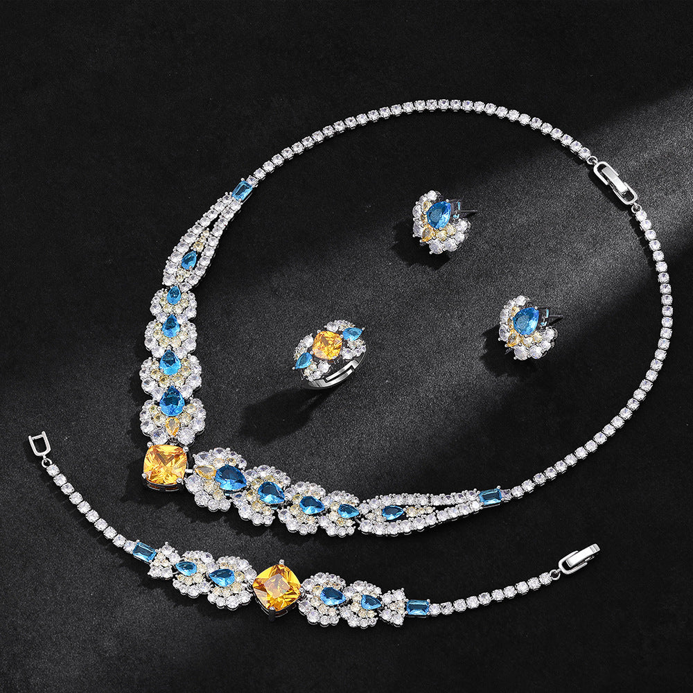 The Soleil Blue & Gold Floral Jewelry Set