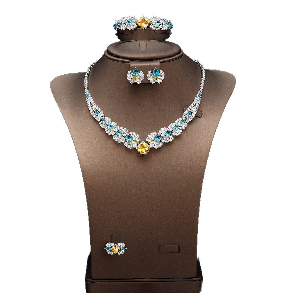 The Soleil Blue & Gold Floral Jewelry Set