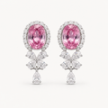 The Alexandra Color Change Stone Stud Earrings on a warm white background
