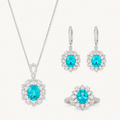 Capri Paraiba blue jewelry suite on warm white