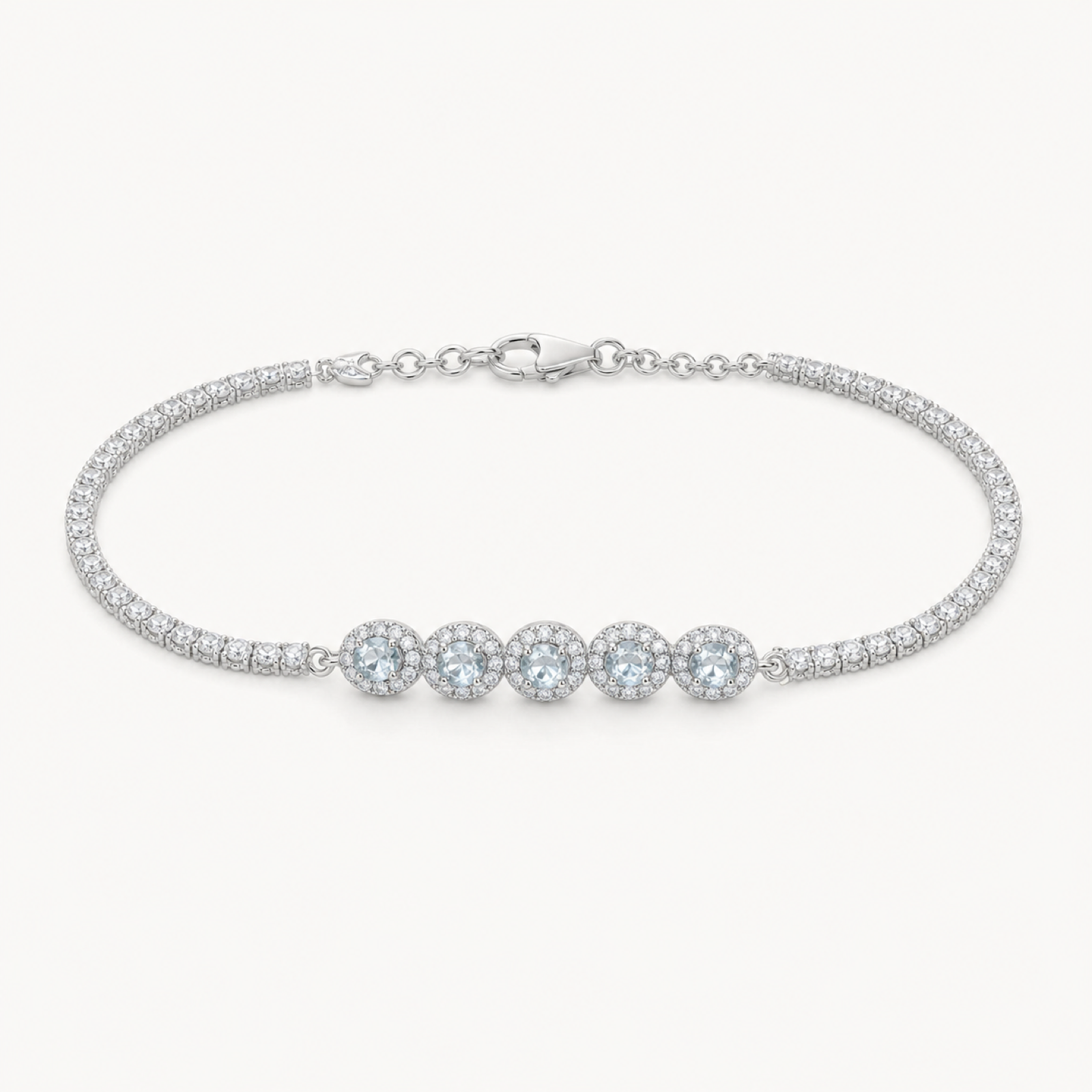 Celeste aquamarine tennis bracelet on warm white