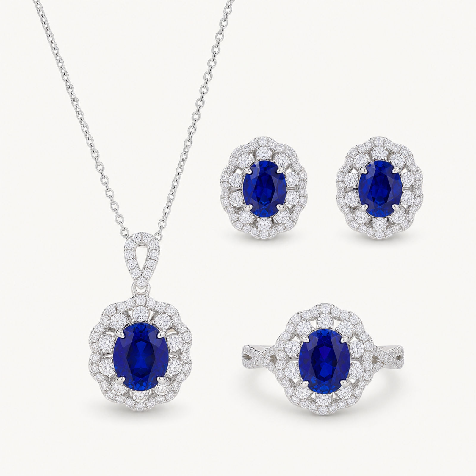 Diana blue sapphire halo jewelry suite on warm white