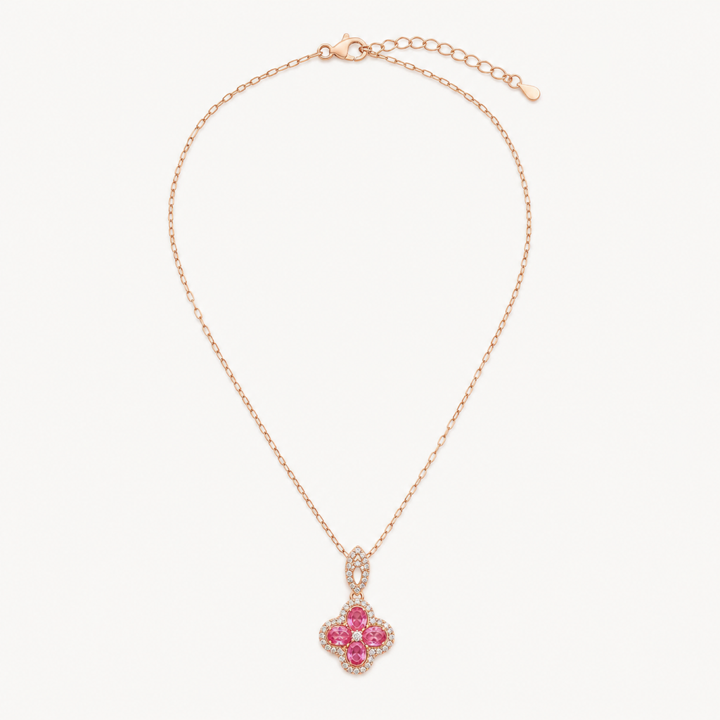 Flora pink clover pendant necklace on warm white