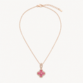 Flora pink clover pendant necklace on warm white