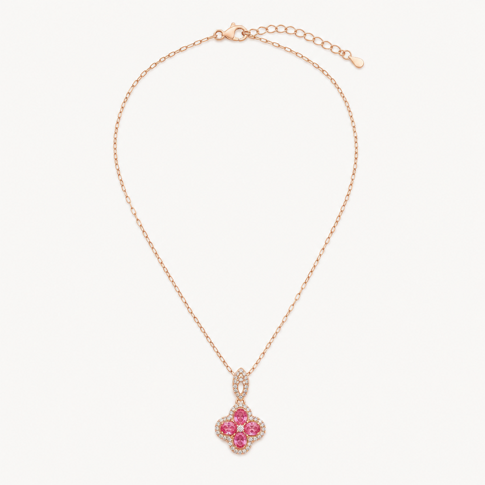 Flora pink clover pendant necklace on warm white