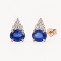 Isla natural sapphire oval stud earrings on warm white