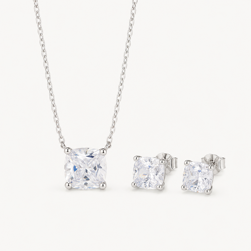 Kitty crystal jewelry duo on warm white
