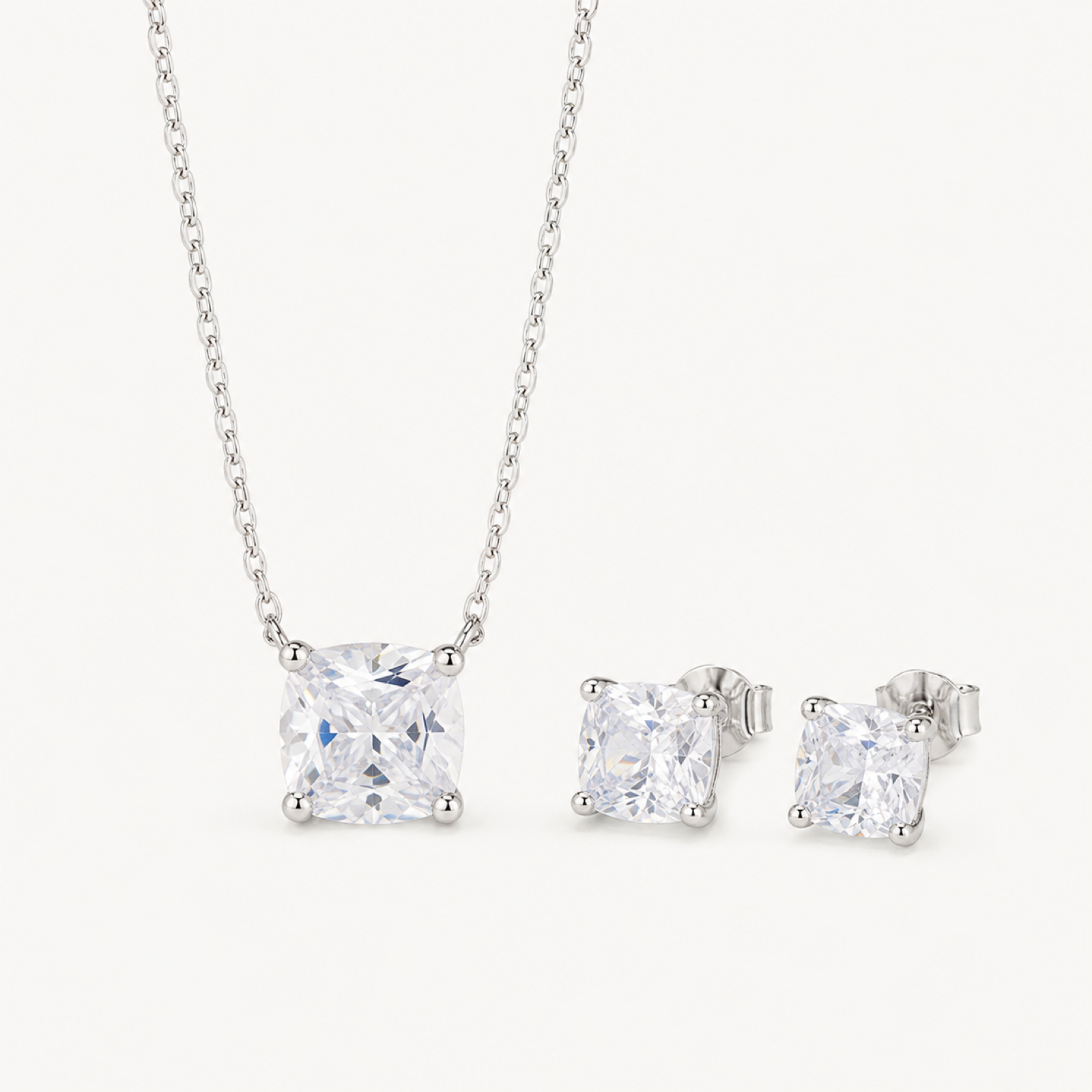 Kitty crystal jewelry duo on warm white