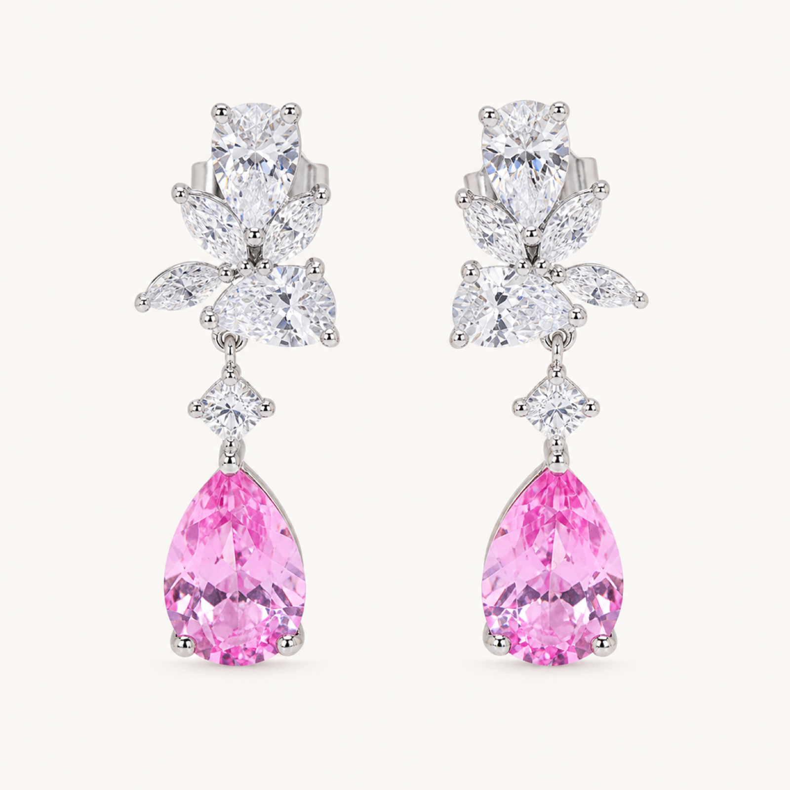 Marielle Morganite Pear Drop Earrings on warm white