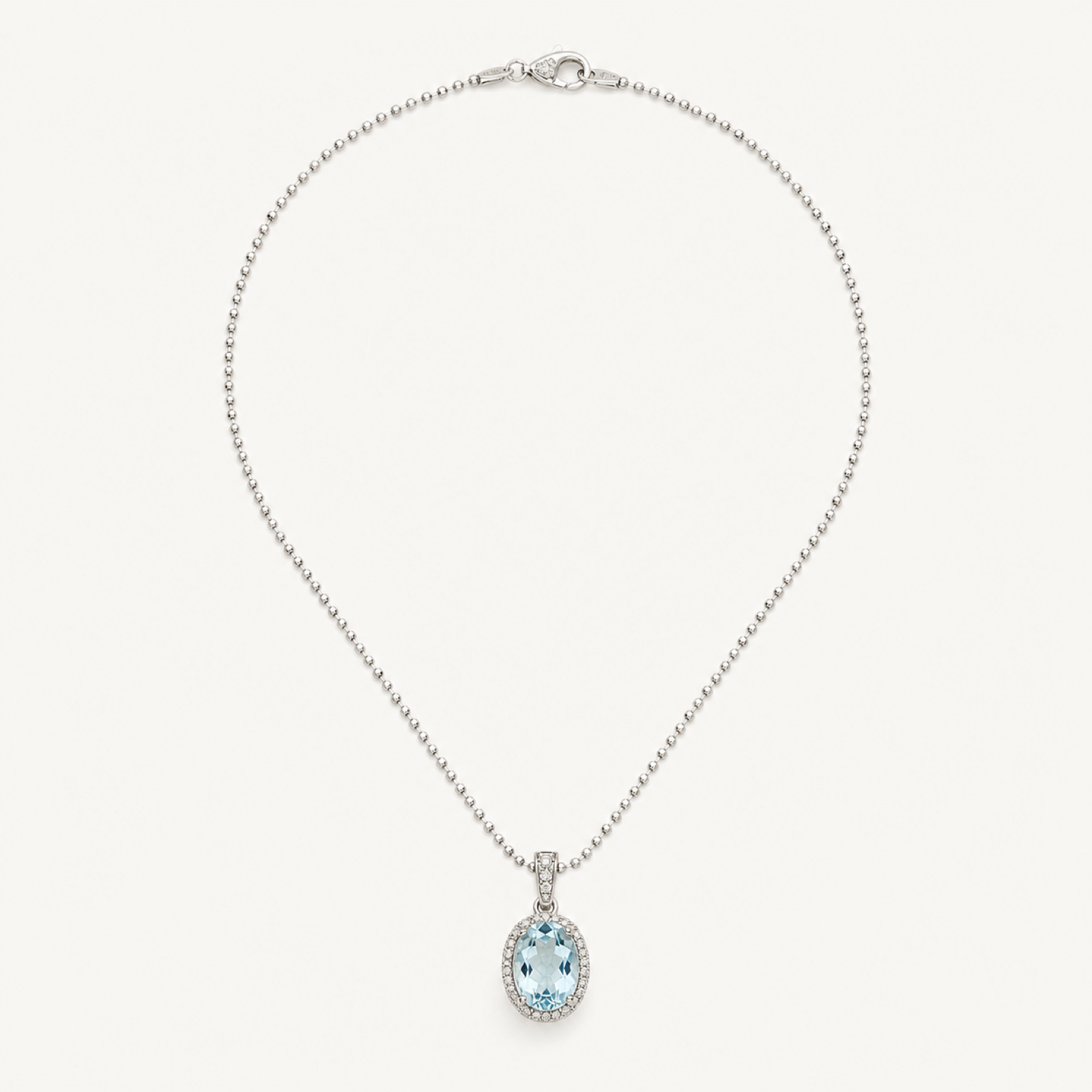 The Oceane Aquamarine Oval Pendant on warm white