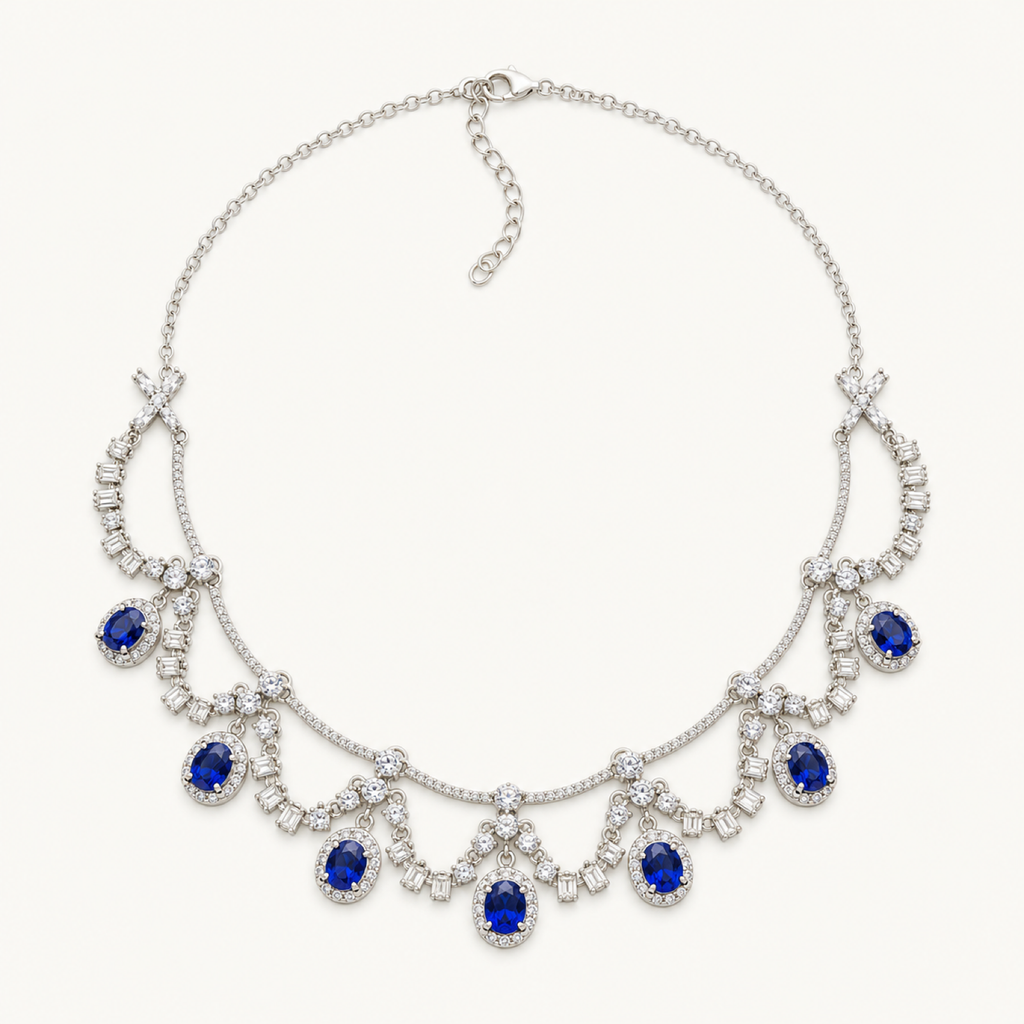 The Royale Natural Blue Sapphire Pendant Necklace on warm white
