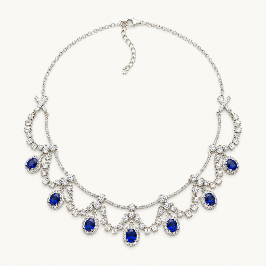 The Royale Natural Blue Sapphire Pendant Necklace on warm white