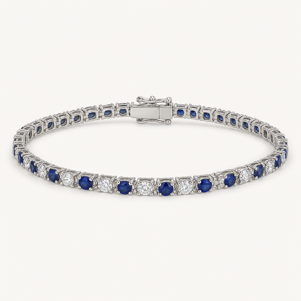 The Sabine Blue Sapphire Tennis Bracelet on warm white