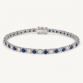 The Sabine Blue Sapphire Tennis Bracelet on warm white