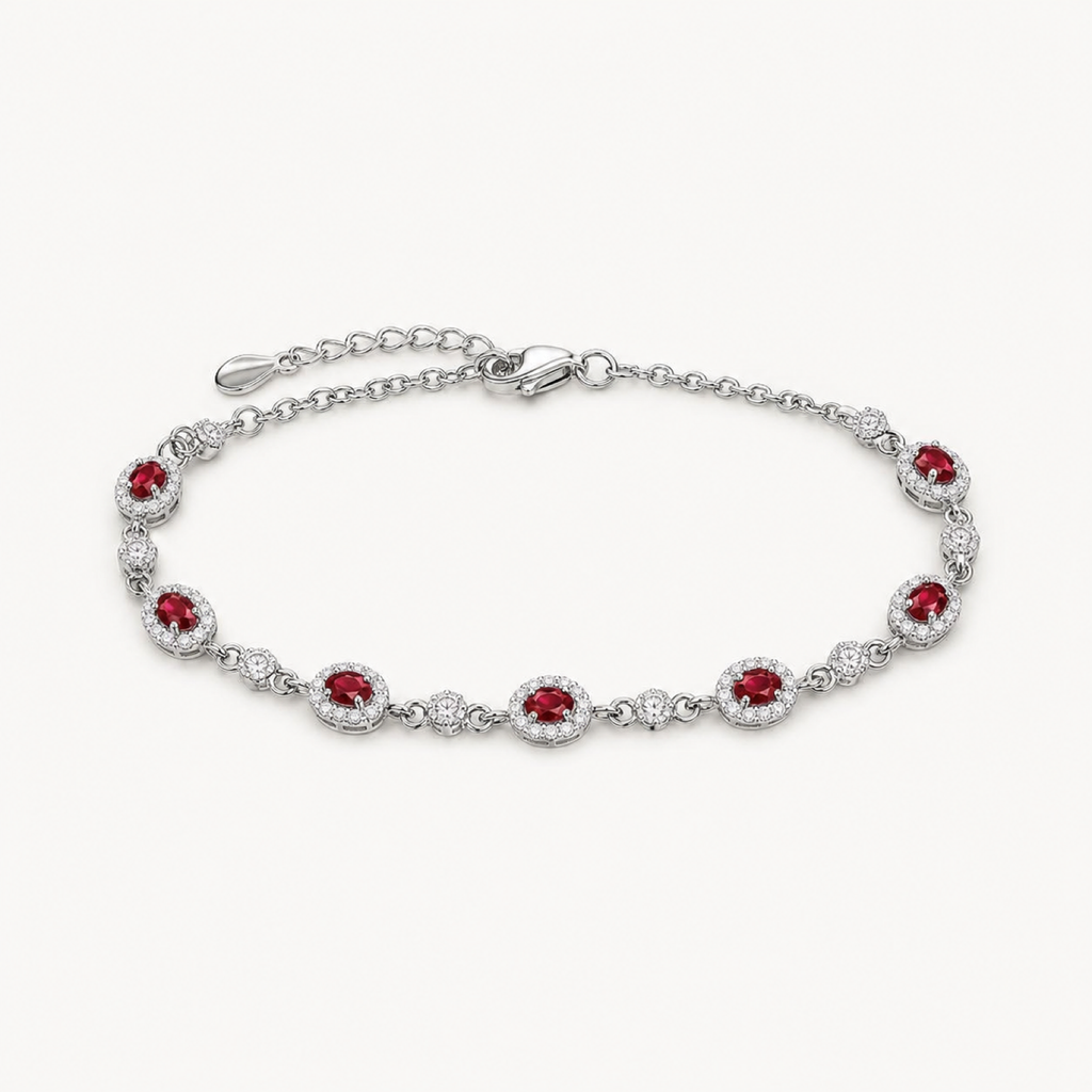 The Amara Ruby Oval Tennis Bracelet on a warm white background