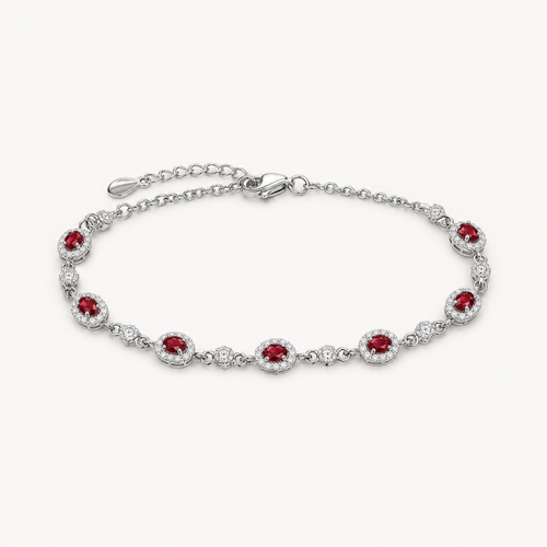 The Amara Ruby Oval Tennis Bracelet on a warm white background