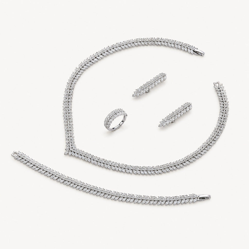 The Camille Classic Crystal Bridal Jewelry Set on a warm white background