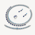 The Celestine Sapphire-Blue Leaf Jewelry Set on a warm white background