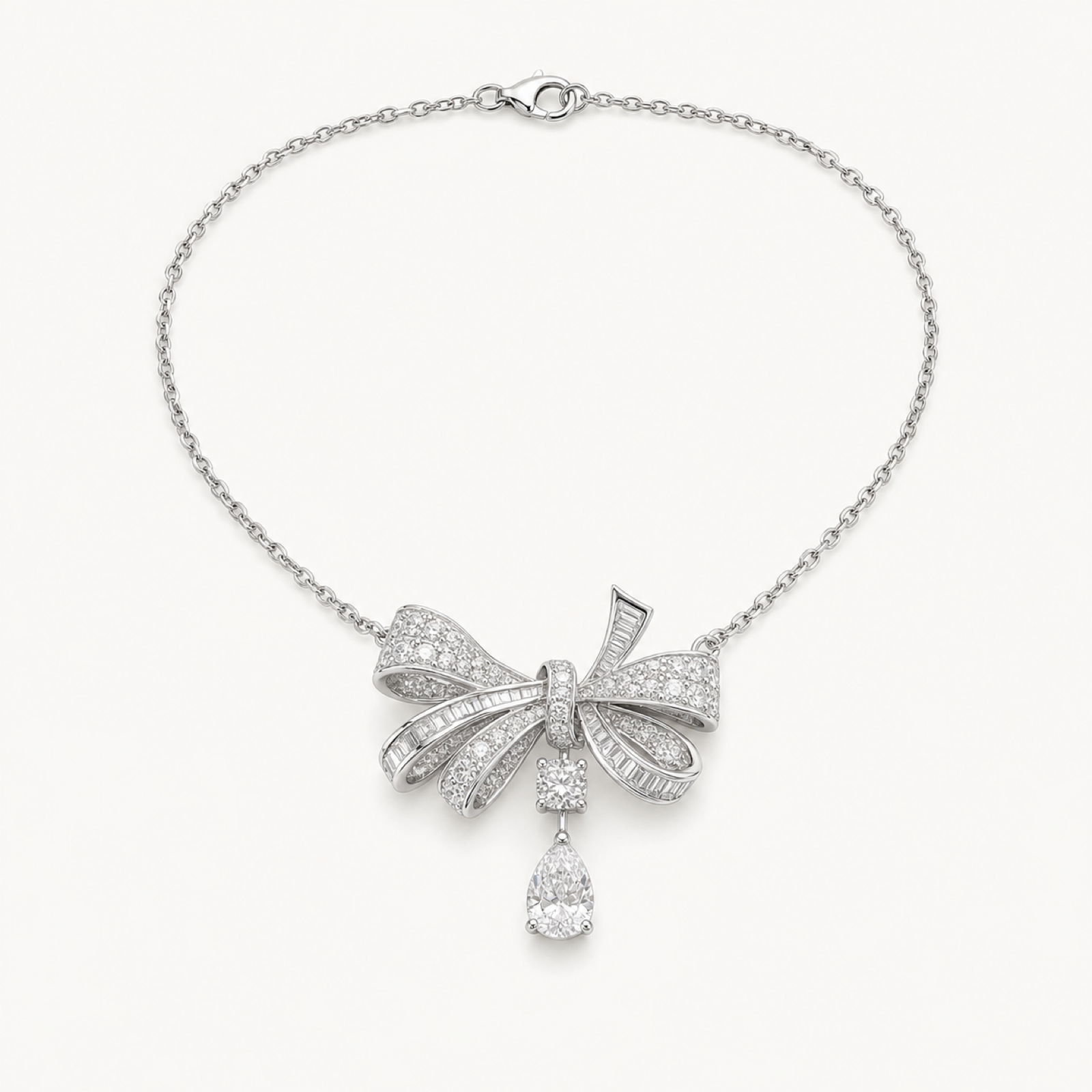Colette bow drop necklace on warm white