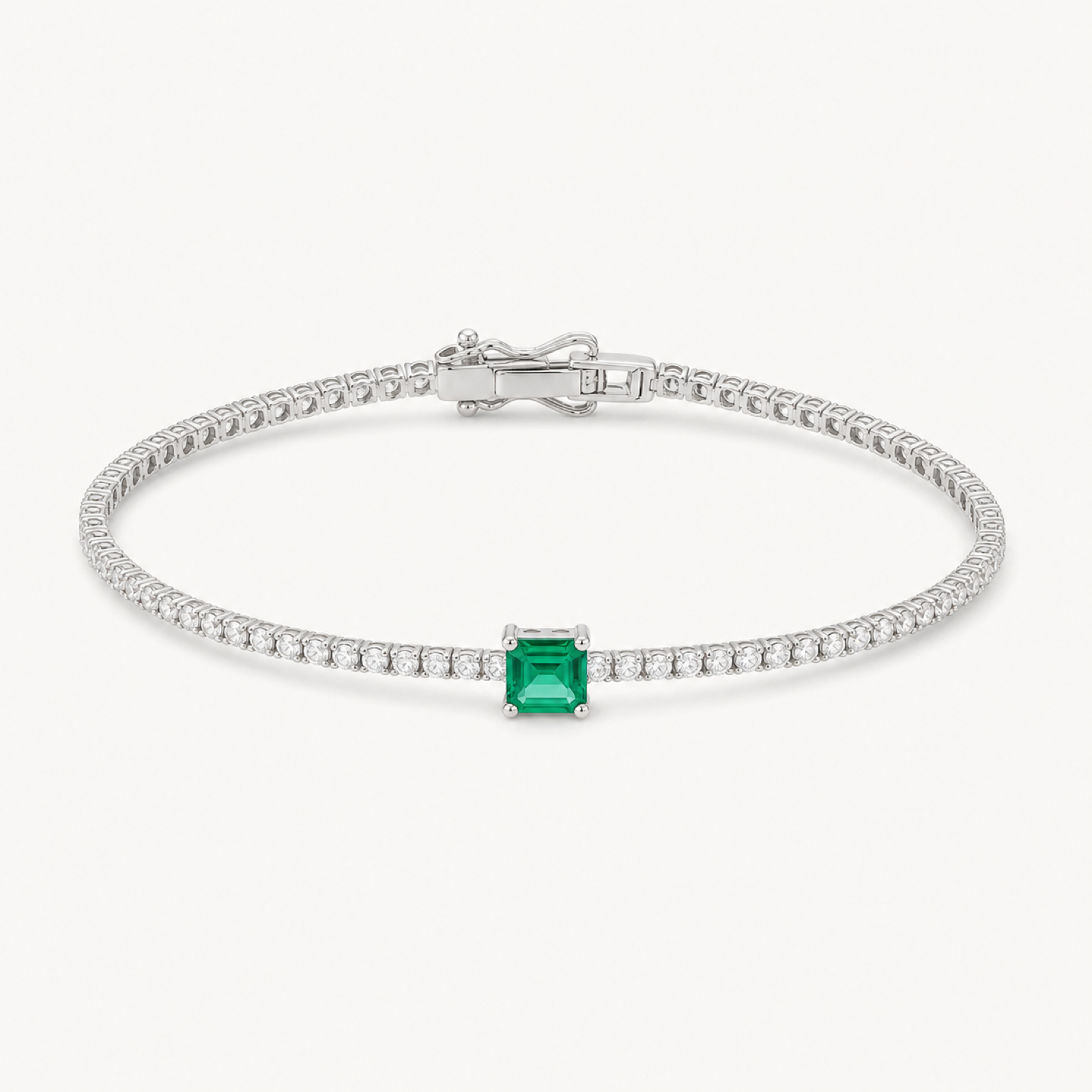 Elan emerald tennis bracelet on warm white