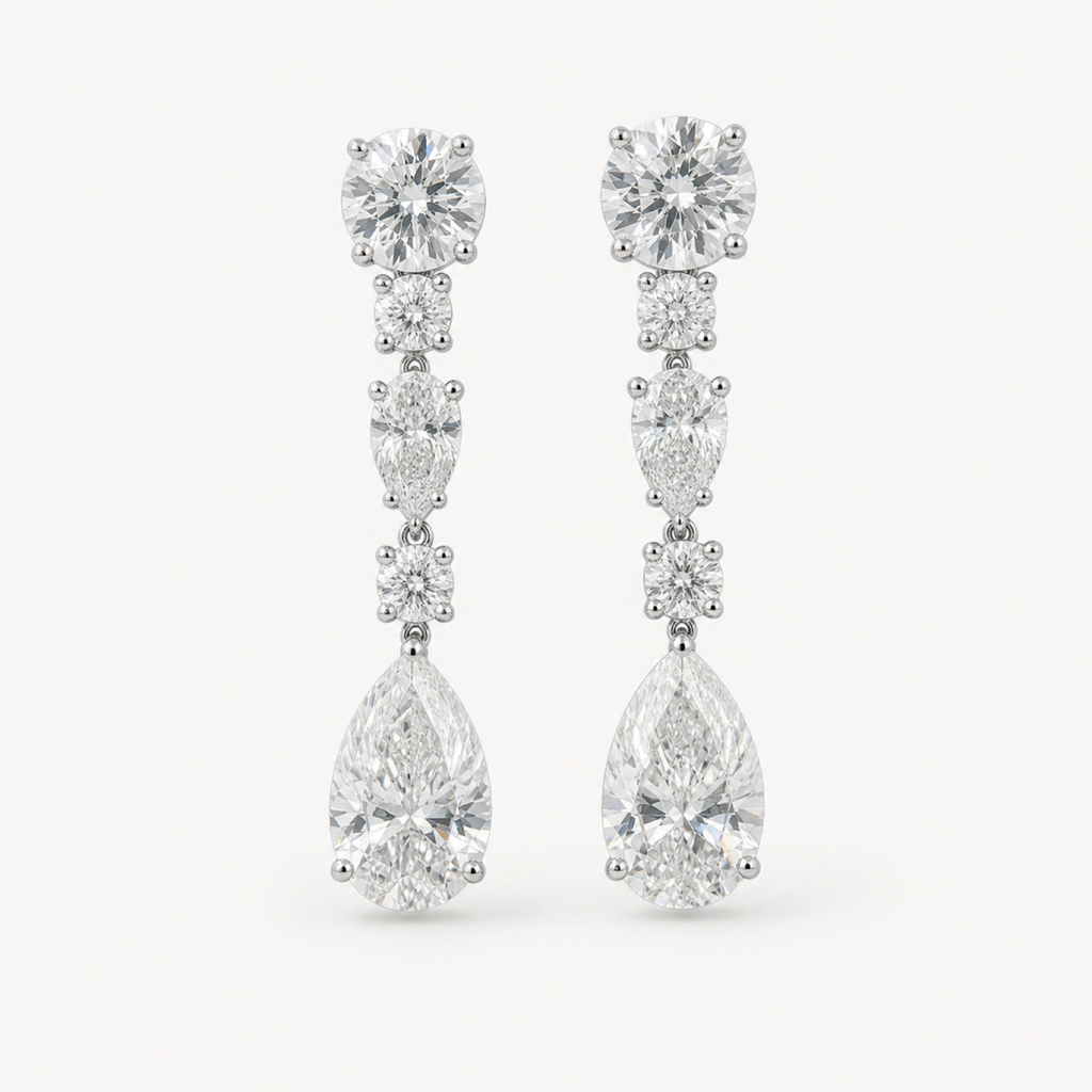 Estelle long pear drop evening earrings on warm white