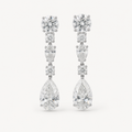 Estelle long pear drop evening earrings on warm white
