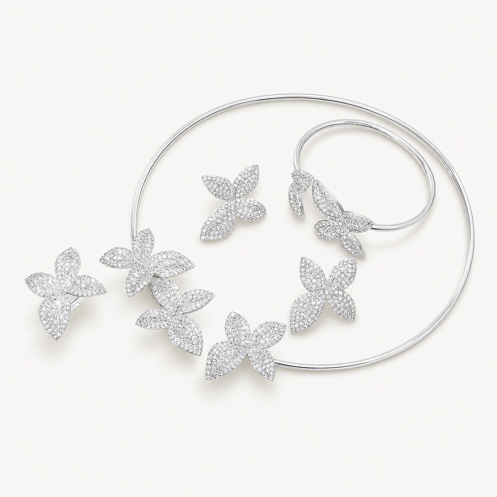 The Fleur Crystal Flower Jewelry Set on a warm white background