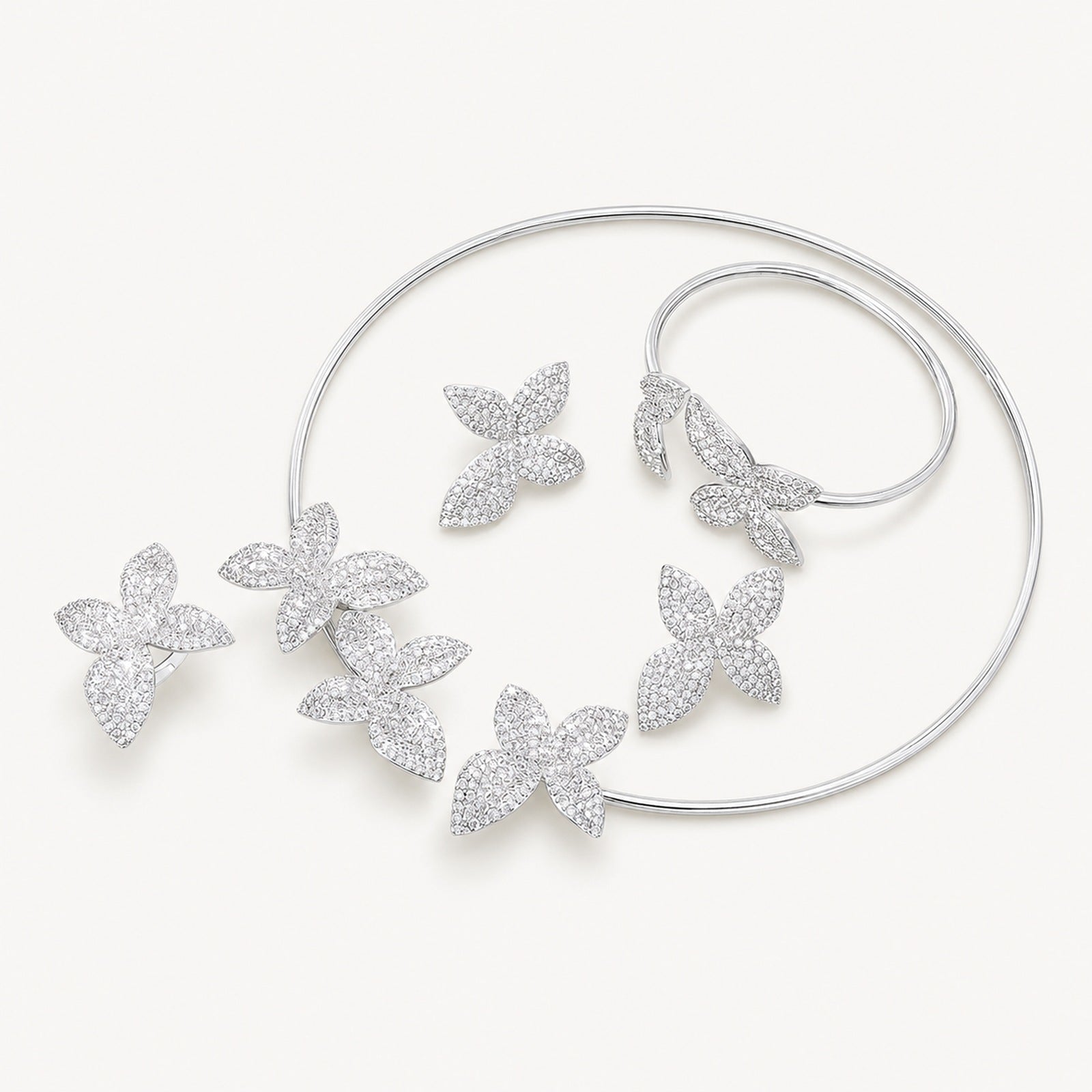 The Fleur Crystal Flower Jewelry Set on a warm white background
