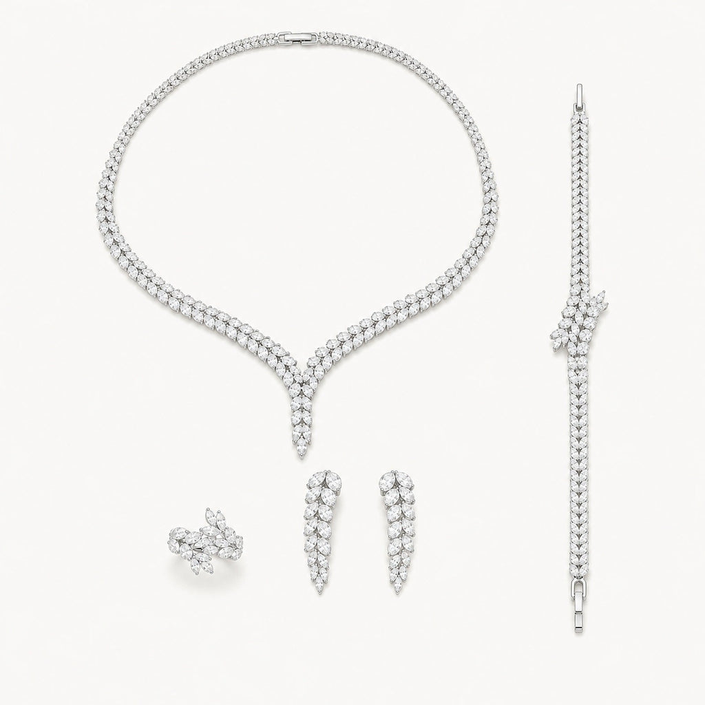 The Genevieve Y-Drop Bridal Jewelry Set on a warm white background