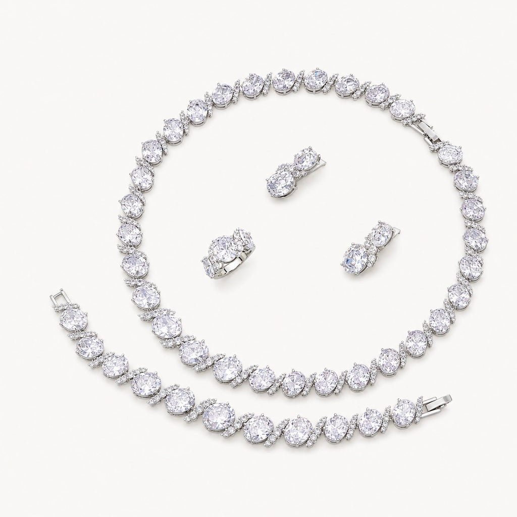 The Odette Oval Crystal Jewelry Set on a warm white background