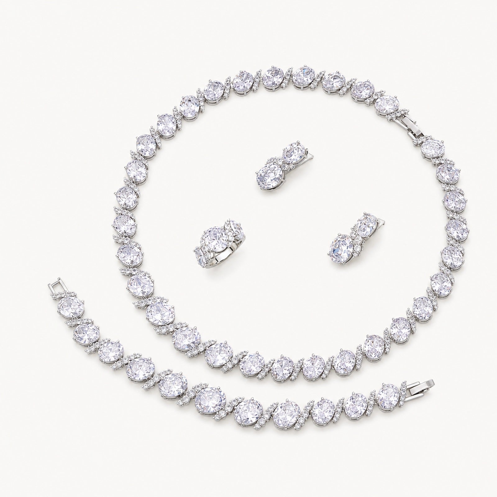The Odette Oval Crystal Jewelry Set on a warm white background