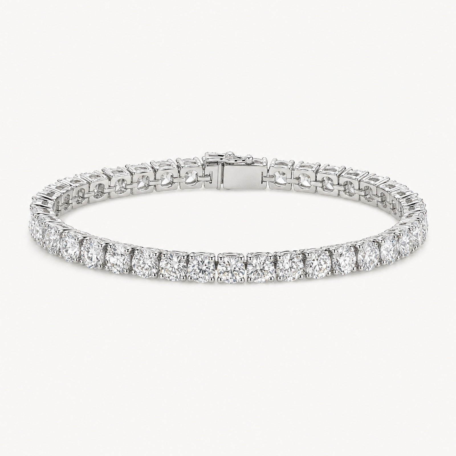 The Riviera Moissanite Tennis Bracelet on a warm white background