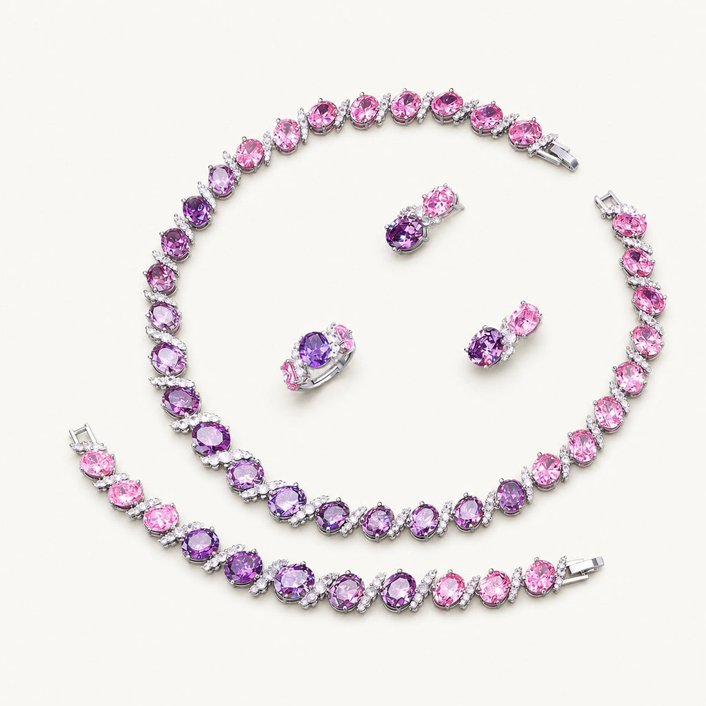 The Rosalie Pink Marquise Jewelry Set on a warm white background
