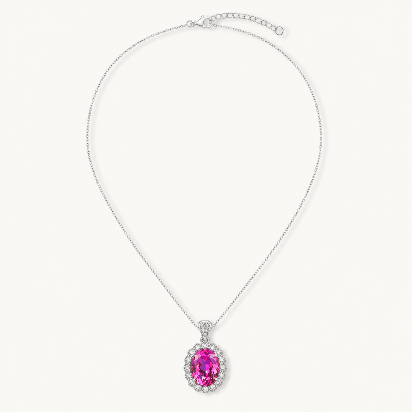 The Roseline Pink Tourmaline Oval Pendant Necklace on warm white