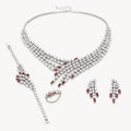 The Valentina Red Baguette Bridal Jewelry Set on a warm white background