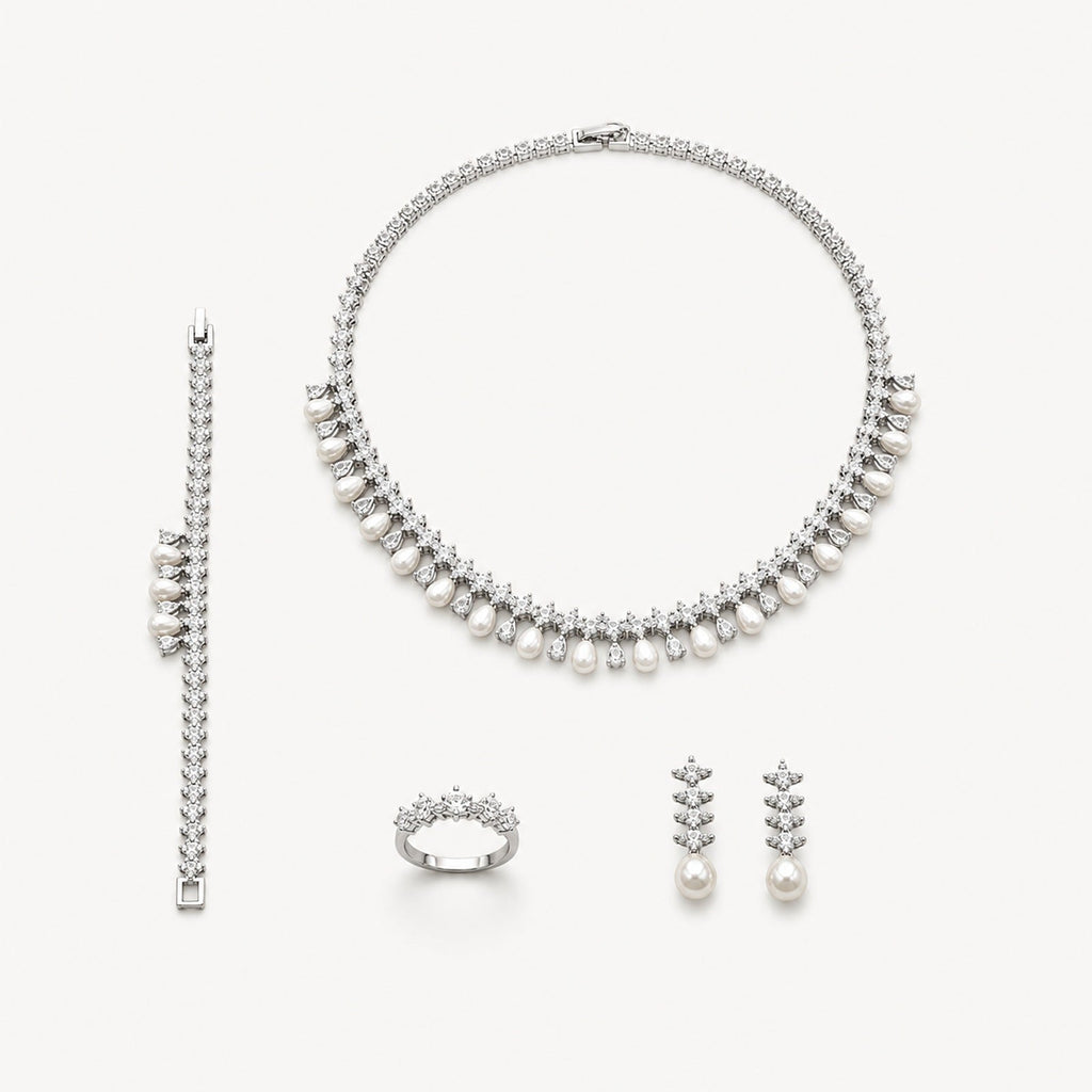 The Vivienne Teardrop Bridal Jewelry Set on a warm white background