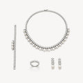 The Vivienne Teardrop Bridal Jewelry Set on a warm white background