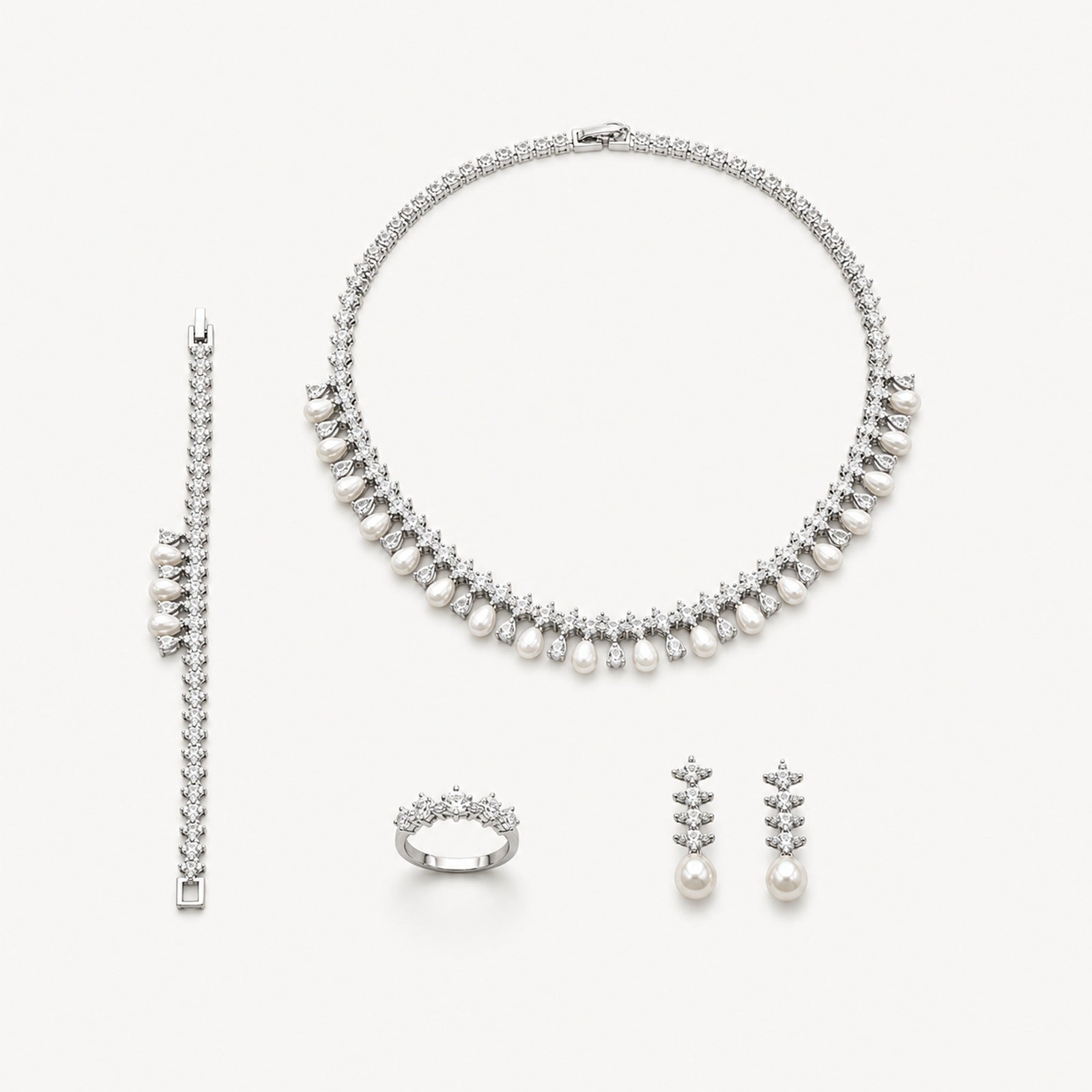 The Vivienne Teardrop Bridal Jewelry Set on a warm white background