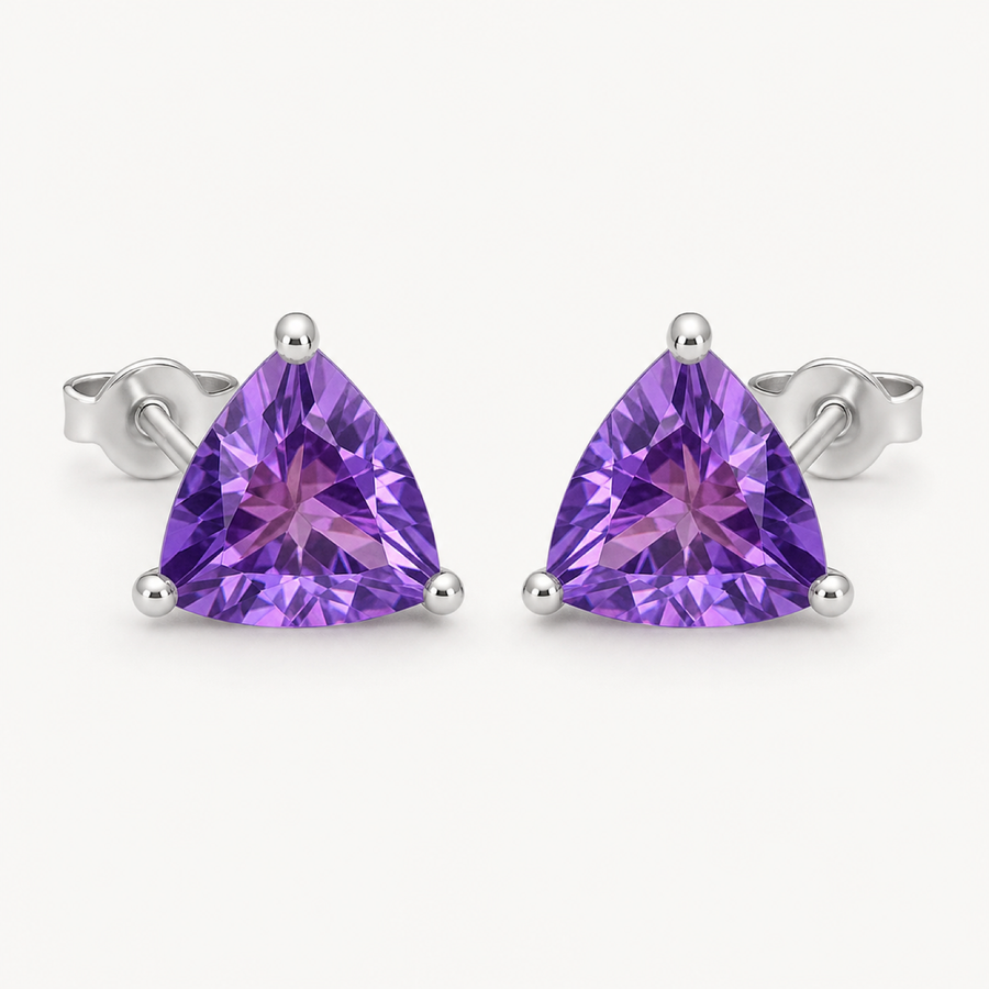 The Violette Natural Amethyst Round Stud Earrings on warm white